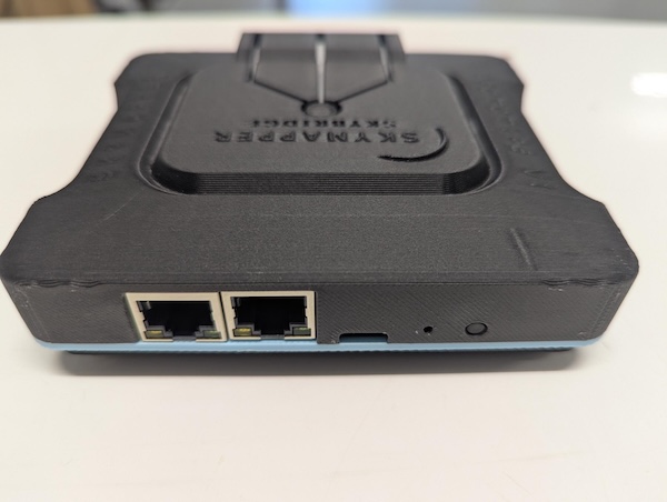 SkyBridge back panel showing the Ethernet ports and USB-C power port